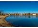 Peaceful pond view showcasing community homes at 234 Sea Lavender Ln, Summerville, SC 29486