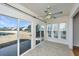 Sunroom with sliding glass doors, offering a scenic pond view at 234 Sea Lavender Ln, Summerville, SC 29486