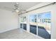Sunroom with a view of the pond and other houses in the community at 234 Sea Lavender Ln, Summerville, SC 29486