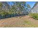Backyard with firepit and privacy fence at 2700 Sunrose Ln, Johns Island, SC 29455
