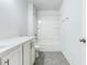 Clean bathroom with white vanity, bathtub, and tile flooring at 2700 Sunrose Ln, Johns Island, SC 29455