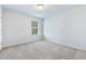 Simple bedroom with carpeted floors and a window with blinds at 2700 Sunrose Ln, Johns Island, SC 29455