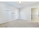 Spacious bedroom with carpet, neutral walls, and shelves at 2700 Sunrose Ln, Johns Island, SC 29455