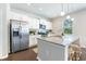 Kitchen with white cabinets, granite countertops, and stainless steel appliances at 2700 Sunrose Ln, Johns Island, SC 29455