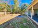 Large backyard with a fire pit and wooden fence at 273 Plantation Ln, Walterboro, SC 29488