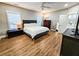 Main bedroom with hardwood floors and private bathroom access at 273 Plantation Ln, Walterboro, SC 29488