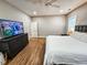 Main bedroom with hardwood floors and private bathroom access at 273 Plantation Ln, Walterboro, SC 29488