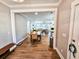 View of dining area with hardwood floors and access to living room at 273 Plantation Ln, Walterboro, SC 29488