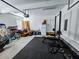 Garage with home gym setup and storage at 273 Plantation Ln, Walterboro, SC 29488
