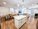 Large kitchen island with white cabinets and quartz countertop at 273 Plantation Ln, Walterboro, SC 29488