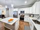 Modern kitchen with white cabinets and quartz countertops at 273 Plantation Ln, Walterboro, SC 29488
