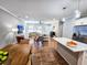 Open concept living area with hardwood floors and modern decor at 273 Plantation Ln, Walterboro, SC 29488