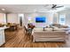 Open living room and dining area with hardwood floors and neutral decor at 273 Plantation Ln, Walterboro, SC 29488