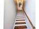 Staircase with wooden steps and handrail leading to the upper level at 273 Plantation Ln, Walterboro, SC 29488