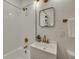 Updated bathroom with white subway tiles and gold fixtures at 2943 Alabama Dr, North Charleston, SC 29405