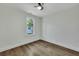 Simple bedroom with hardwood floors and a window at 2943 Alabama Dr, North Charleston, SC 29405