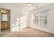 Spacious bedroom with window and private bathroom access at 2978 Sugarberry Ln, Johns Island, SC 29455