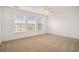 Bright bedroom with neutral carpeting and ceiling fan at 2978 Sugarberry Ln, Johns Island, SC 29455