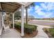 Relaxing front porch overlooking a lake and walking path at 2978 Sugarberry Ln, Johns Island, SC 29455
