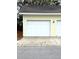 Attached garage with white door and concrete driveway at 2978 Sugarberry Ln, Johns Island, SC 29455