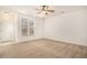 Spacious living room with neutral carpet and ceiling fan at 2978 Sugarberry Ln, Johns Island, SC 29455