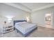 Serene bedroom with blue bed and ensuite bathroom access at 3012 Emma Ln, Mount Pleasant, SC 29466