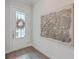 Bright entryway with white door and large floral wall art at 3012 Emma Ln, Mount Pleasant, SC 29466