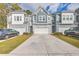 Two-story townhome with gray siding, white trim, and attached garage at 3012 Emma Ln, Mount Pleasant, SC 29466