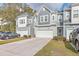 Charming two-story townhome with gray siding and two-car garage at 3012 Emma Ln, Mount Pleasant, SC 29466
