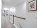 Upstairs hallway with a gallery wall and carpeted flooring at 3012 Emma Ln, Mount Pleasant, SC 29466
