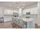 Modern kitchen with white cabinets, quartz countertops, and island at 3012 Emma Ln, Mount Pleasant, SC 29466