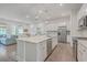 Open concept kitchen boasts white cabinets, large island, and stainless steel appliances at 3012 Emma Ln, Mount Pleasant, SC 29466