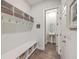 Convenient laundry room with built-in shelving and bench at 3012 Emma Ln, Mount Pleasant, SC 29466