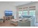 Living room features sectional sofa and large TV at 3012 Emma Ln, Mount Pleasant, SC 29466