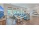 Light and airy living room with sectional sofa and backyard access at 3012 Emma Ln, Mount Pleasant, SC 29466