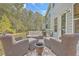 Relaxing patio with wicker furniture and grill, perfect for outdoor entertaining at 3012 Emma Ln, Mount Pleasant, SC 29466
