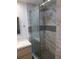 Modern bathroom with a large walk-in shower, marble tile, and glass enclosure at 345 Sea Cloud Cir # 345, Edisto Island, SC 29438