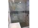 Updated bathroom featuring a frameless glass shower door and marble-look tile at 345 Sea Cloud Cir # 345, Edisto Island, SC 29438