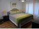 King-size bed, hardwood floors, and plenty of natural light at 345 Sea Cloud Cir # 345, Edisto Island, SC 29438