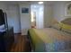 King bed, hardwood floors, and private bathroom access at 345 Sea Cloud Cir # 345, Edisto Island, SC 29438
