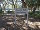 Palmetto Walk boat parking sign in a wooded area at 345 Sea Cloud Cir # 345, Edisto Island, SC 29438