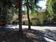 Light yellow building with parking and lush landscaping at 345 Sea Cloud Cir # 345, Edisto Island, SC 29438