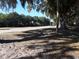 Golf course fairway with trees and a distant home at 345 Sea Cloud Cir # 345, Edisto Island, SC 29438