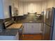 Small kitchen with stainless steel appliances and granite countertops at 345 Sea Cloud Cir # 345, Edisto Island, SC 29438