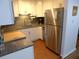 Small kitchen with stainless steel appliances and granite countertops at 345 Sea Cloud Cir # 345, Edisto Island, SC 29438