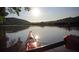 Two kayakers paddle down a calm river at sunset at 418 Evening Glow Ln, Summerville, SC 29486