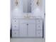 Stylish bathroom with white vanity, marble countertop, and a scalloped mirror at 420 Greenwich St, Mount Pleasant, SC 29464