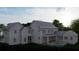 Two story house with gray siding and a pool at 420 Greenwich St, Mount Pleasant, SC 29464