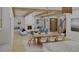 Open living and dining area with fireplace and built-in seating at 420 Greenwich St, Mount Pleasant, SC 29464