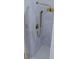 Spa-like shower with marble walls, gold fixtures and penny round tile floor at 420 Greenwich St, Mount Pleasant, SC 29464